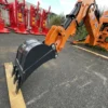 Universal backhoe with bucket for agricultural tractors